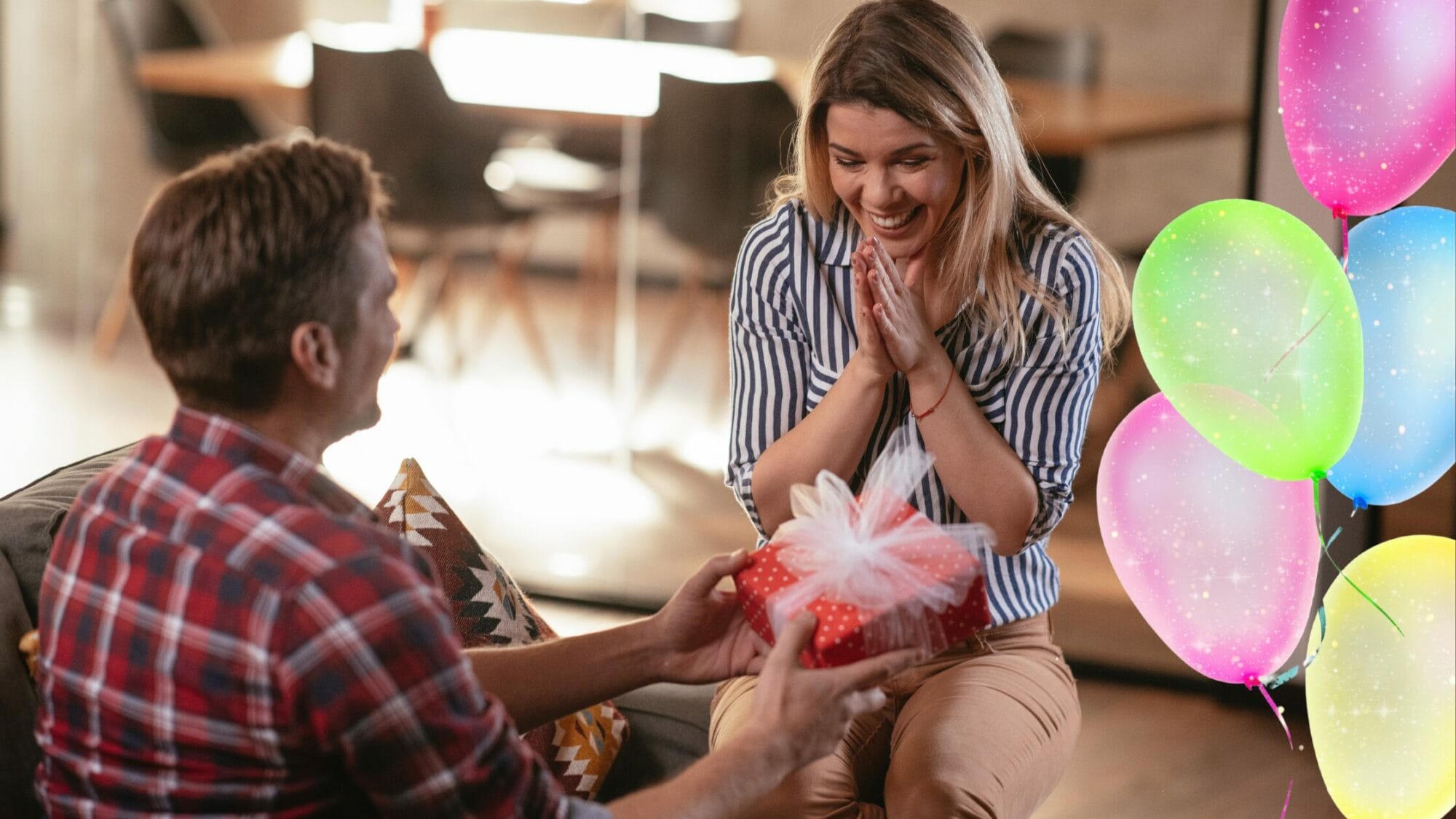 Man gifting present to woman on birthday